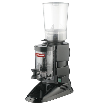 Automatic coffee grinder with portion unit