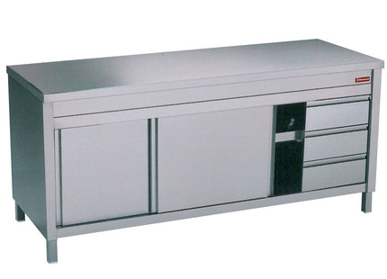 Table on neutral cupboard and 3 drawers on the right